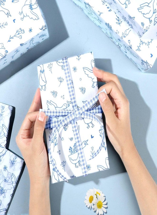 ورق تغليف هدايا مزخرف برسومات أوزة زرقاء من باينراب، ١٠٠ ورقة، مقاس ١٤ × ٢٠ بوصة. ورق تغليف هدايا مزخرف برسومات أوزة زرقاء، مناسب لحفلات أعياد الميلاد، وحفلات استقبال المولود، وحفلات الزفاف، وحفلات توديع العزوبية. - Image 4
